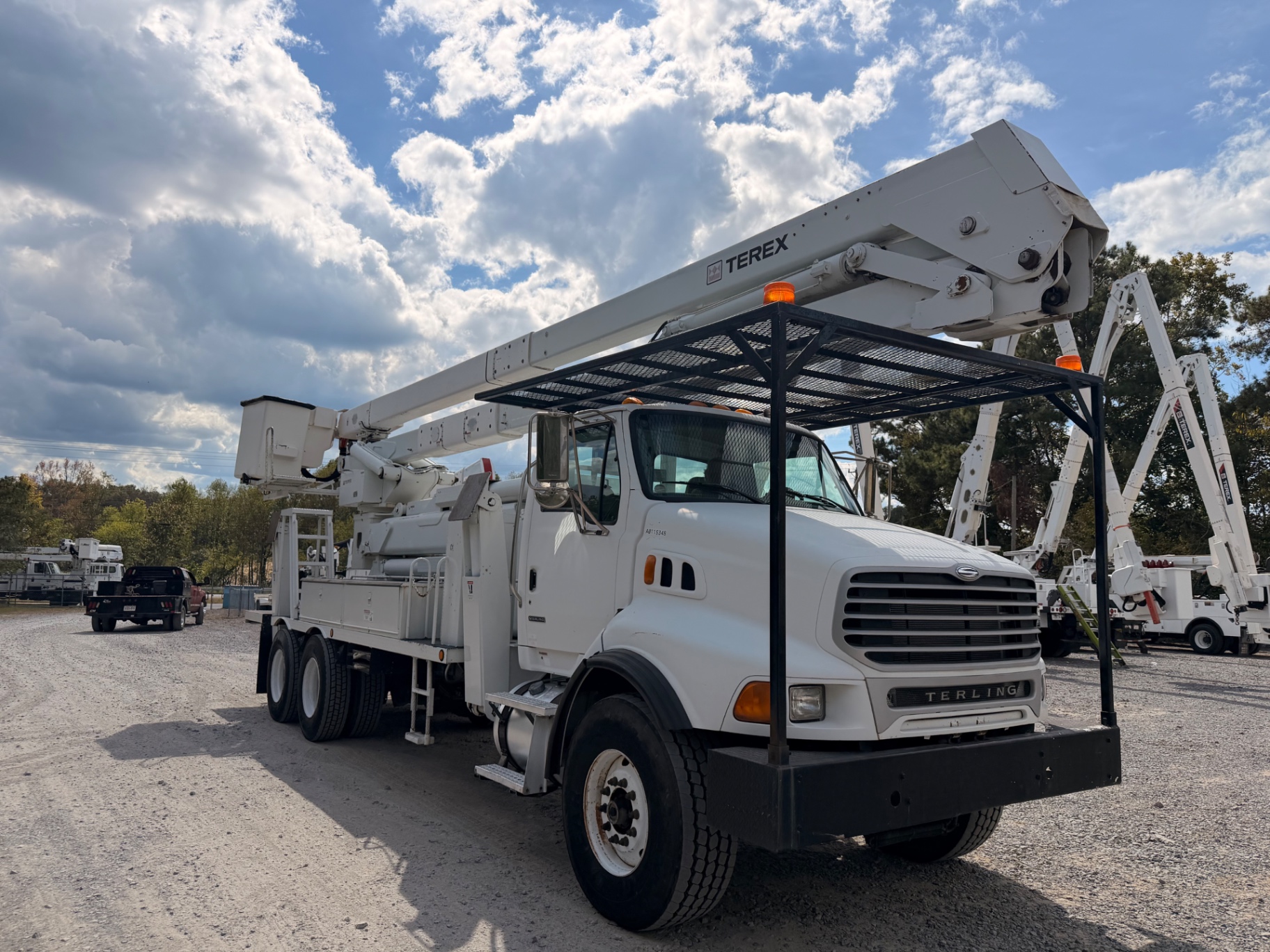 Front-side view showing Terex boom and dual rear wheels