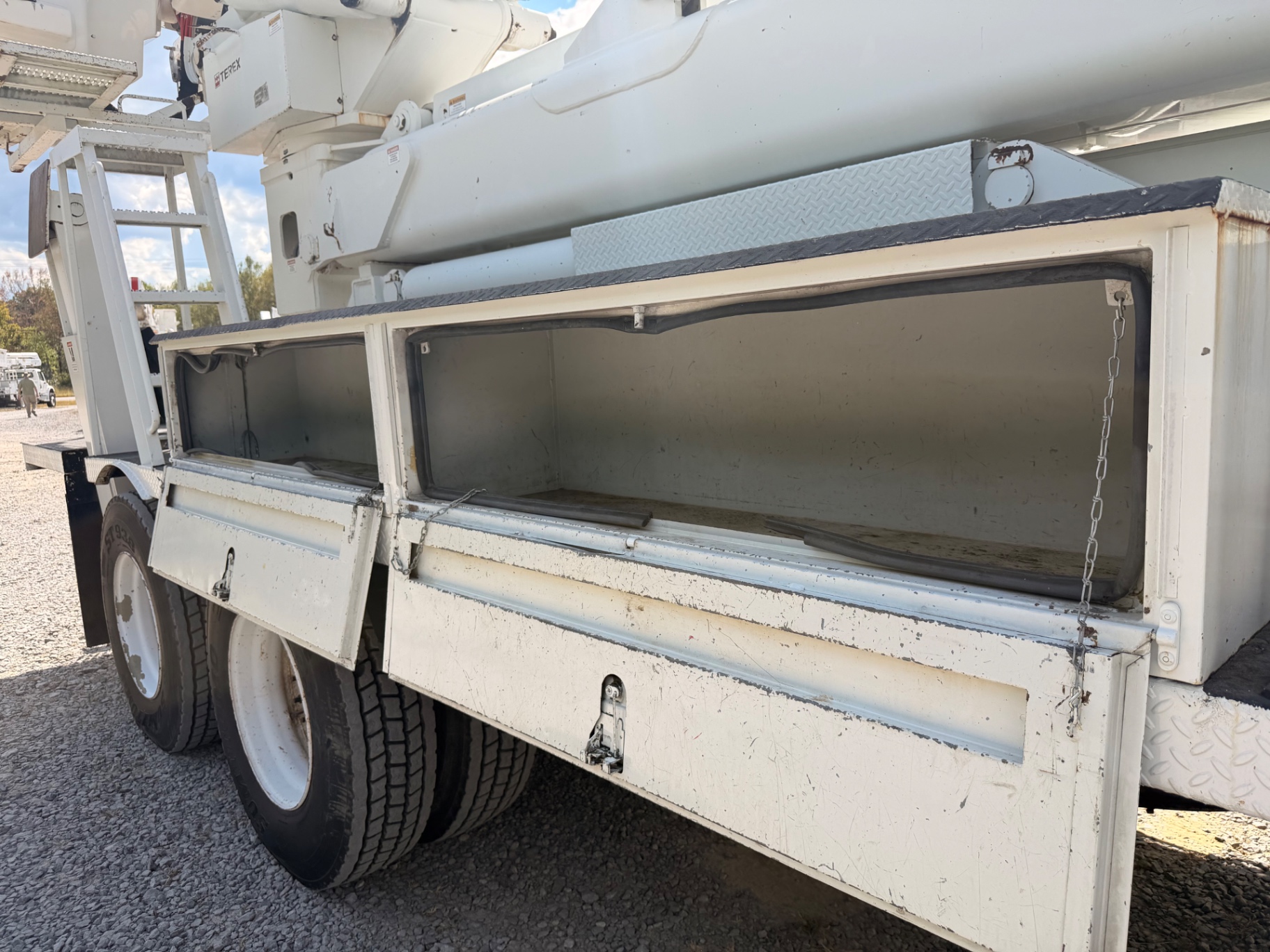 Open storage compartments and Terex boom pedestal