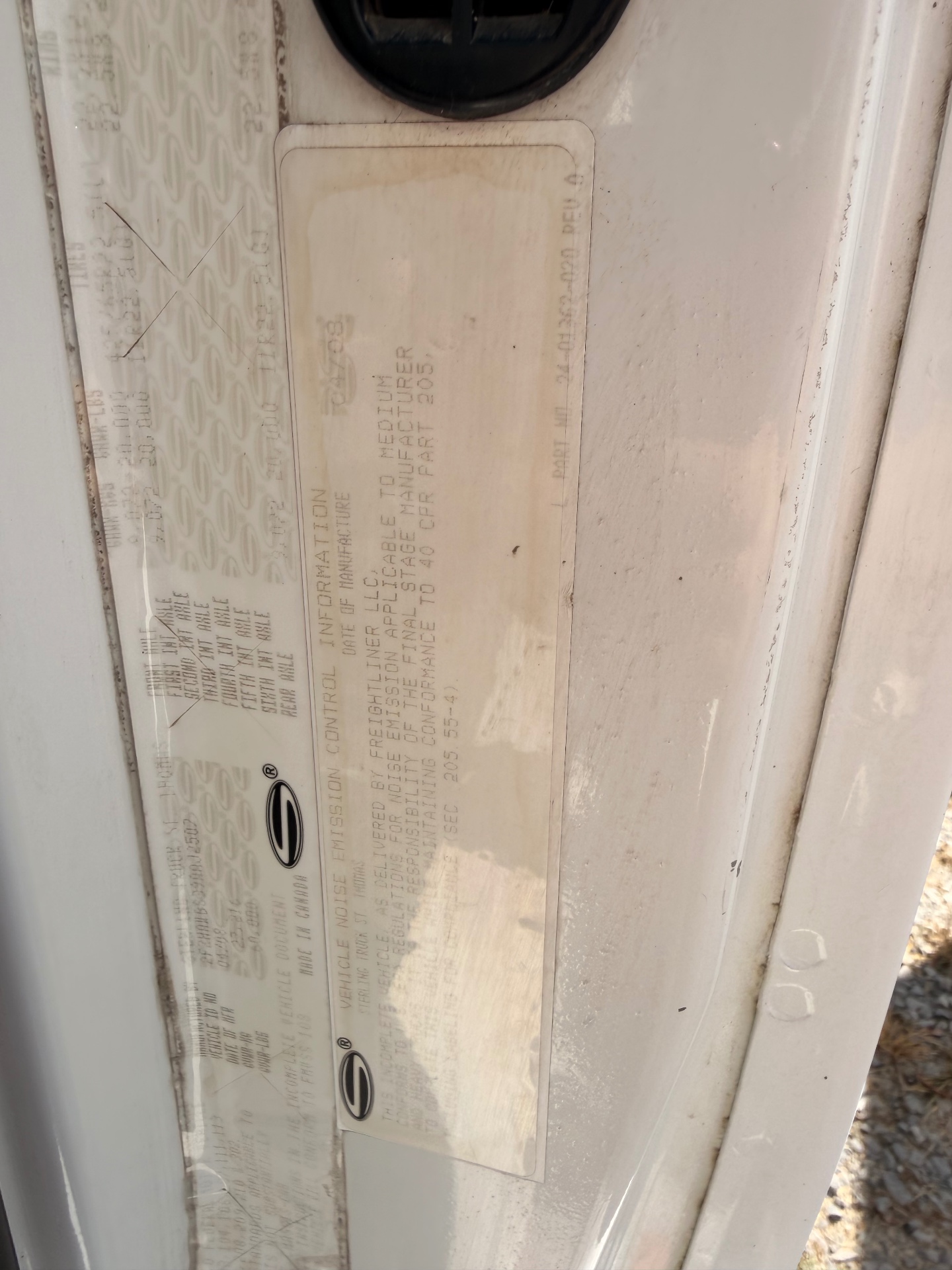 Vehicle certification label on door pillar